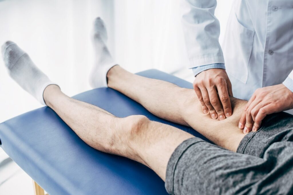 physiotherapist on leg